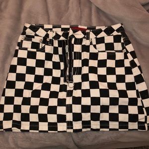 Black checkered mini skirt with circle ring